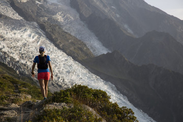 athlete running on high mountain