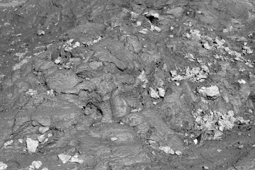 abstract grey background - waste sludge similar to the surface of the moon.