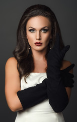 Fototapeta premium woman in black glove studio portrait