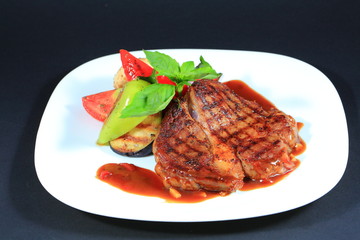Elegant meat dish. Steak.