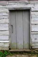 A door of a old building on a close up view.