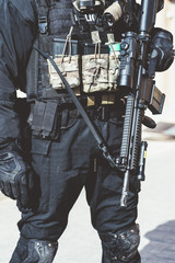 An unrecognizable armed person