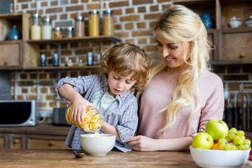 mother and son having breakfast