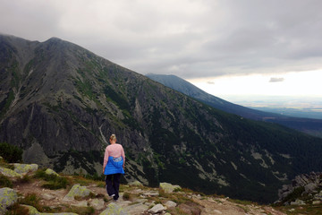 Fototapeta premium Tourist admiring High Tatras