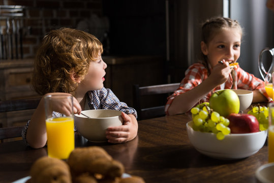 Siblings Eating Breakfast