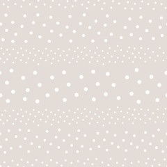 Polka dot seamless pattern, vector monochrome subtle texture in soft pastel colors, white & beige. Abstract background with randomly scattered different circles. Design for decor, textile, fabric, web