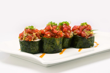 Spicy Chutoro shushi, Spicy Chutoro rolls in white plate on white background