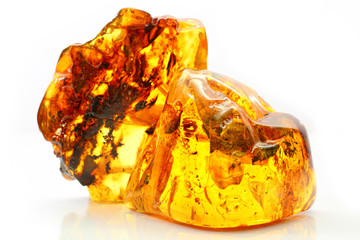 Natural amber. Two extraordinarily beautiful pieces of transparent yellow amber with inclusions on...