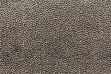 Texture of a vintage brown leather retouched retoucher close-up