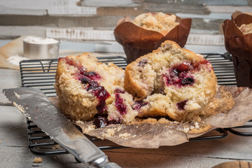 Muffins with red fruits jam fill.