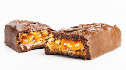Closeup of chocolate,peanut and caramel bar isolated