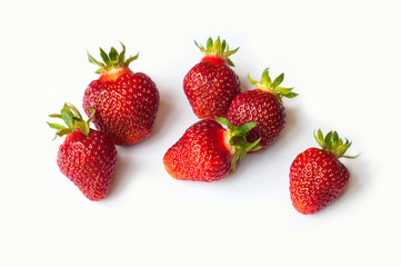 Group of Fresh Strawberry isolated on white background. Freshly picked ripe red strawberries.