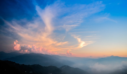 Panoramic bird eye aerial view of beautiful morning sunrise, dramatic cloud of sea under bright blue sky in Taiwan