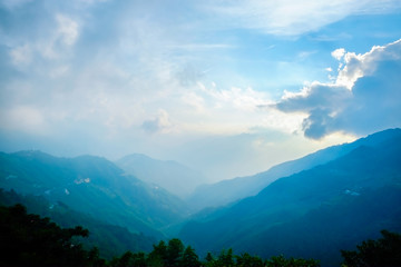 Panoramic bird eye aerial view of beautiful morning sunrise, dramatic cloud of sea under bright blue sky in Taiwan