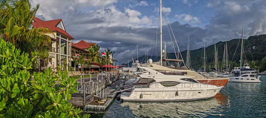 A few luxury yachts at the berth of Eden island, Seychelles