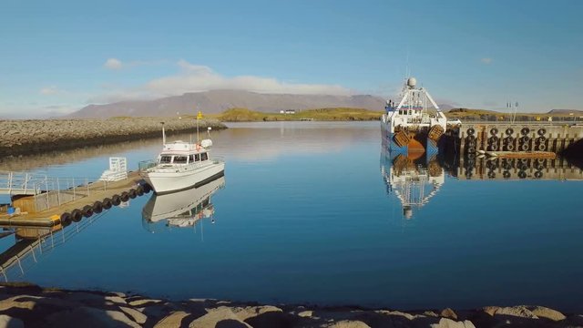 Videy island in sunny weather, view from new harbor of Reykjavik