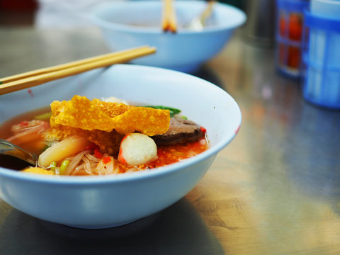 Thai Local Traditional Street Stall Food: Noodle Soup With Red Bean Curd 