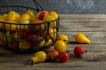 Colorful tomatoes in the basket