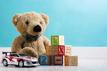 Foto op Canvas Teddy bear and toys in a baby's room     © chandlervid85