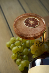 Alcoholic cocktail grape mojito with lime and cognac