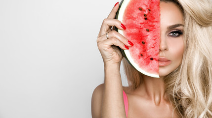 Beautiful, woman with long blonde hair,   keeps the face watermelon , she have  amazing eyes and...