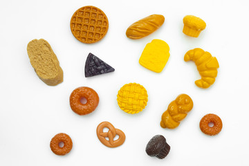 Group of bakery and pastries plastic toys for children in isolated white background
