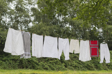 Old-fashioned clothesline with clothing.