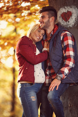 smiling loving couple in the park.