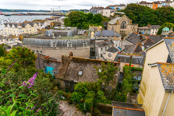 Roofs of buildings covered with sar roof tile, beautiful English architecture, ocean