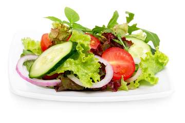 Fresh vegetable salad isolated on white