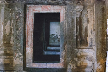 Fototapeta na wymiar View of the temple courtyard and corridors of Bala Krishna in Hampi, Karnataka, India. Old and famous Indian landmark, World Heritage.