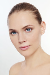 Obraz premium Portrait of young beautiful healthy girl with clean make-up, copy space