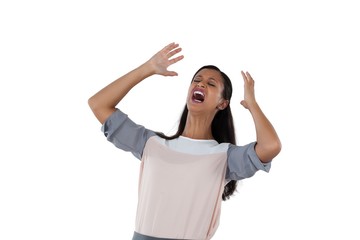 Businesswoman shouting against white background