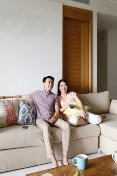 Young couple relaxing at home