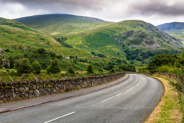 Curved road in Welsh countryside