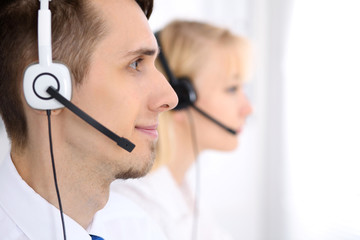 Young business man in headset. Call center