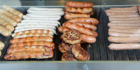 wurstel bake on the hot street food stall grid