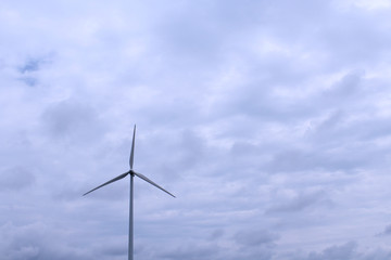 Dark Cloudy Day with Windmill on the Horizon