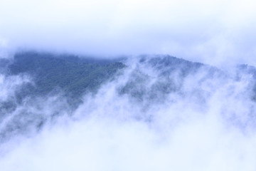 The Fog and Clouds Meet in the Middle of the Smoking Mountains