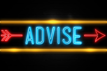 Advise  - fluorescent Neon Sign on brickwall Front view