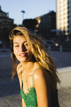 Portrait of relaxing girl in a sunny day.
