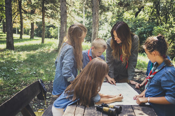 Childern Scouts Learning Orinetation Using A Map