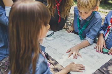 Childern Scouts Learning Orinetation Using A Map