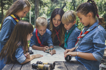 Childern Scouts Learning Orinetation Using A Map