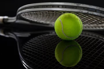 Rolgordijnen Close up of racket on fluorescent yellow tennis ball with © WavebreakMediaMicro