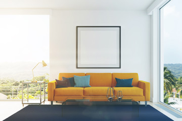 Yellow sofa, blue pillows living room toned