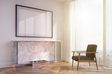 White living room, fireplace, black armchair toned