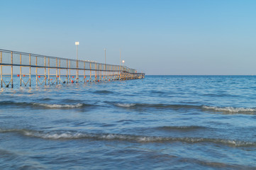 Fototapeta premium beach and sea at blue hour, summer vacation at the sea