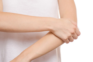 Female hand hurts the elbow of a hand