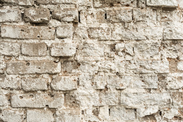 texture of an old ruined brick wall of an ancient building